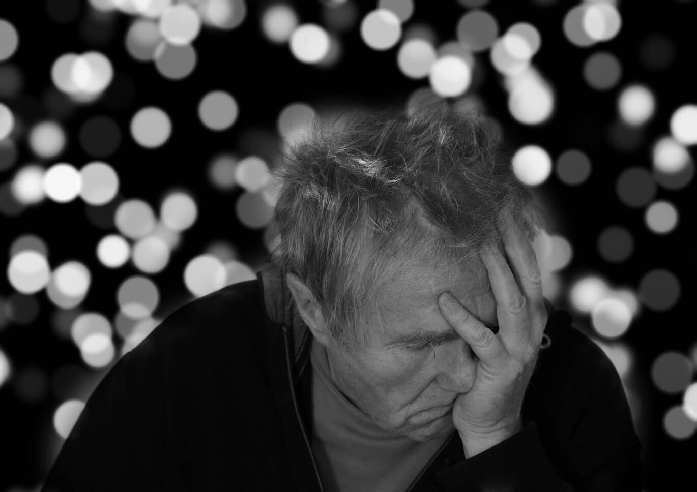 An upset old man having Alzheimer's disease
